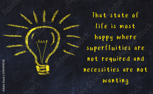 Black chalkboard with a bulb sketch and smart quote photo