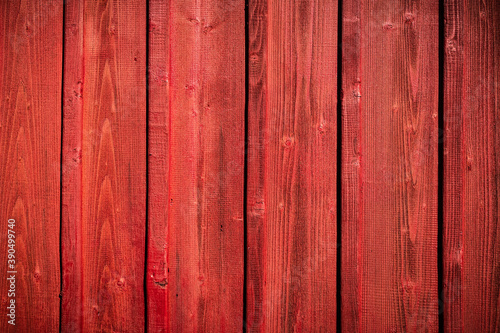 Red wooden grunge board closeup. Natural texture. Can be used like nature background