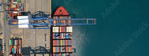 Fotografie, Obraz Aerial top down ultra wide photo of industrial cargo container ship loading in l
