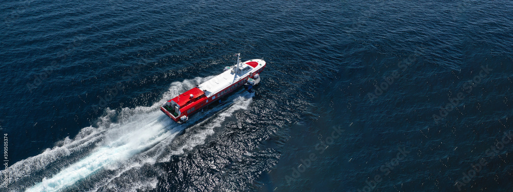 Fototapeta premium Aerial drone ultra wide photo of Hellenic Seaways high speed passenger ferry or 
