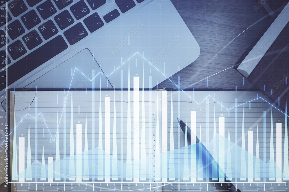 Stock market graph and top view computer on the table background. Multi exposure. Concept of financial education. Stock market graph and top view computer on the table background. Multi exposure. Concept of financial education.