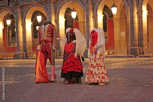Madrid urban artists, disguised as typical characters of Spanish culture but without heads. © Victor Photo Stock