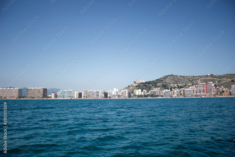 Panoramic view from the sea, of the holiday town of Cullera in Valencia, southern Spain.