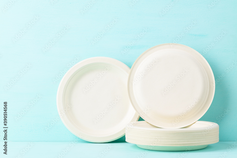 Biodegradable, Compostable, Disposable or Eco friendly utensil plate on pastel color background, Sustainable concept Biodegradable, Compostable, Disposable or Eco friendly utensil plate on pastel color background, Sustainable concept