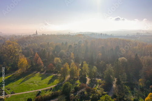 Church with misty Forest in autumn golden Sunlight 01