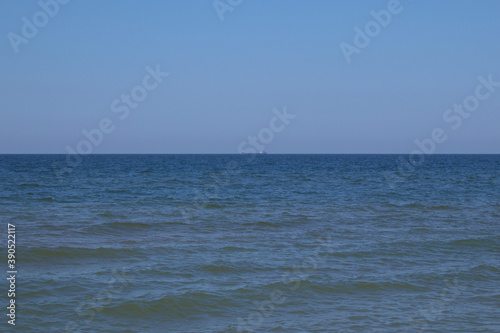 Fototapeta Naklejka Na Ścianę i Meble -  Beach on the coast of the sea of Azov. Kuchuguri