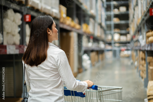 woman looking and shopping in warehouse store