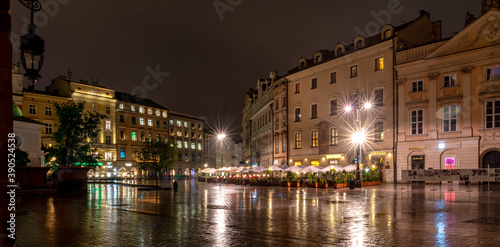 Main Market Square Krakow at night after the rain.