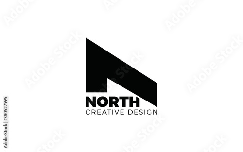 Letter N logo formed north symbol with solid black color photo