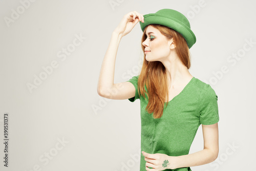 Holidays St. Patrick's Day pretty woman with shamrock on her hand