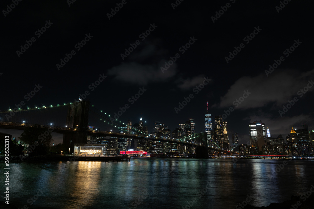 Brooklyn bridge at night form the park

