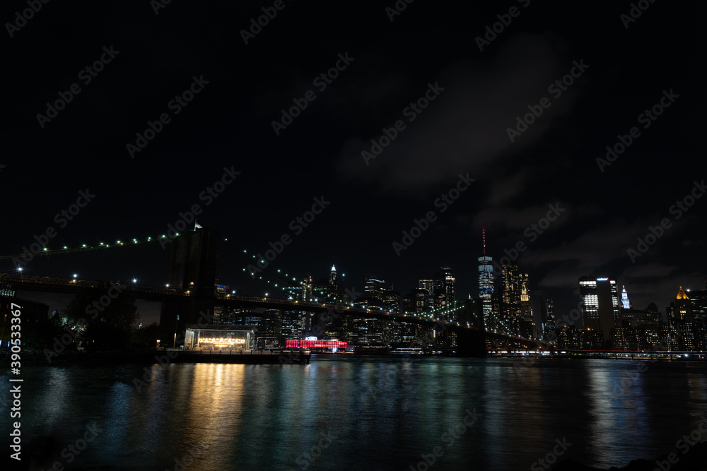 Brooklyn bridge at night form the park

