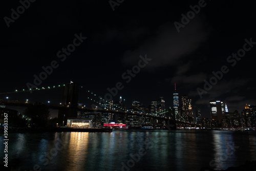 Brooklyn bridge at night form the park  