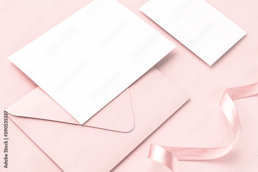 Blank card and envelope on a pink background Blank card and envelope on a pink background