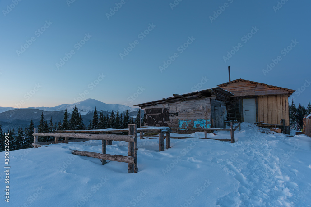 Snowy winter in the Ukrainian Carpathians and picturesque mountain houses Snowy winter in the Ukrainian Carpathians and picturesque mountain houses