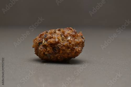 singe piece of INDIAN CHINESE DRY and crispy GOBI MANCHURIAN BALLS for cooking in gravy photo