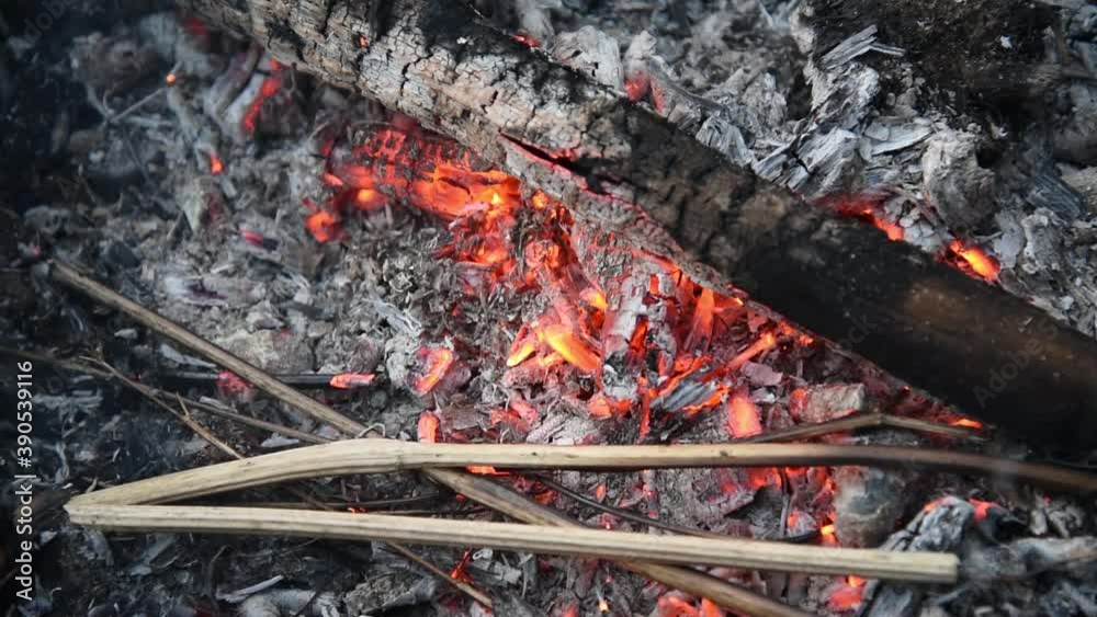 Coals that smolder in the grill. A dying fire. Living fire. Coals that smolder in the grill. A dying fire. Living fire.