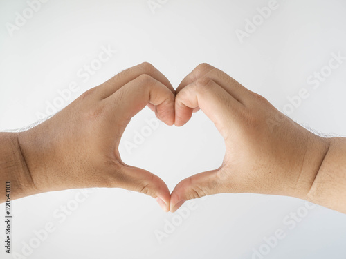 Men put their fingers together in a heart shape. Show love and charm With a white background