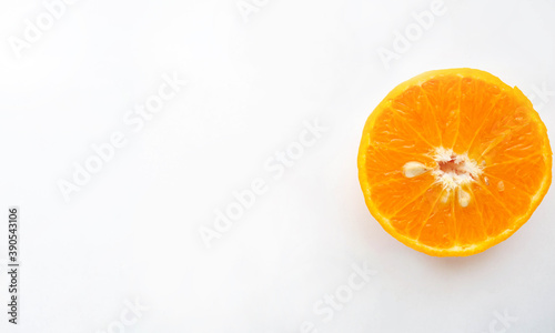 Orange displays details of orange slices and orange seeds on a separate white background.