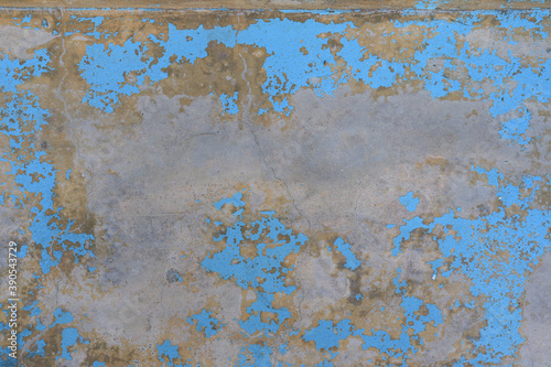 scratch blue dye on concrete wall