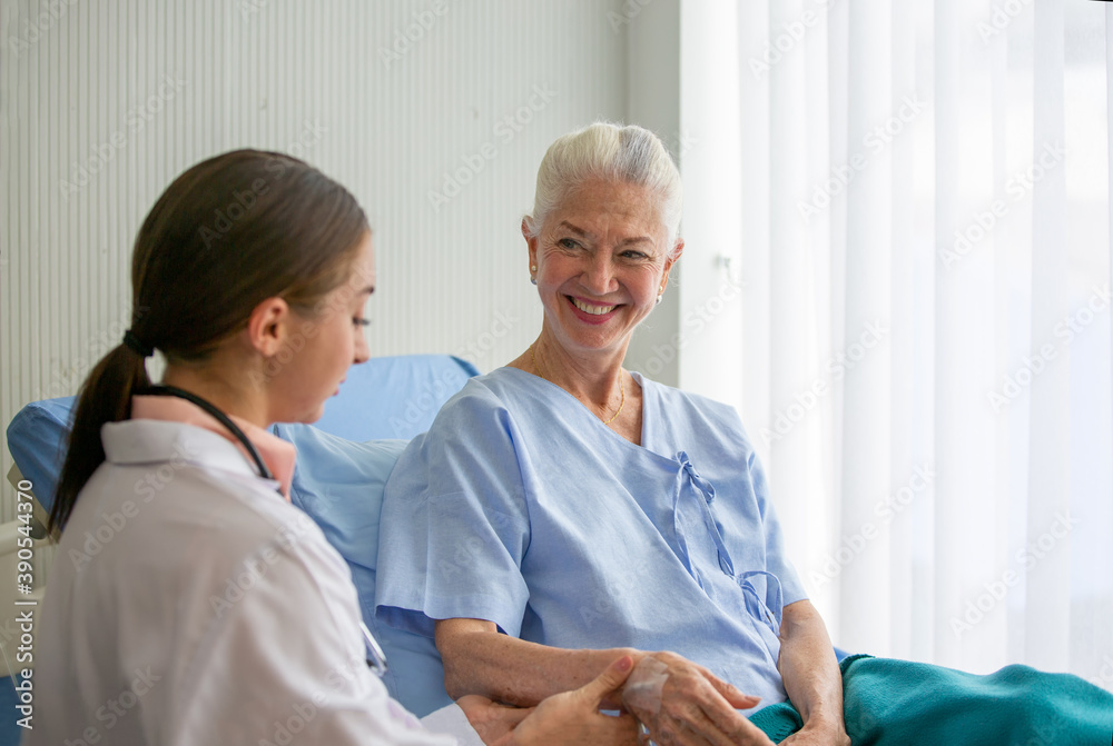 doctor and patient, Female doctor doing medical exam to a senior woman doctor and patient, Female doctor doing medical exam to a senior woman