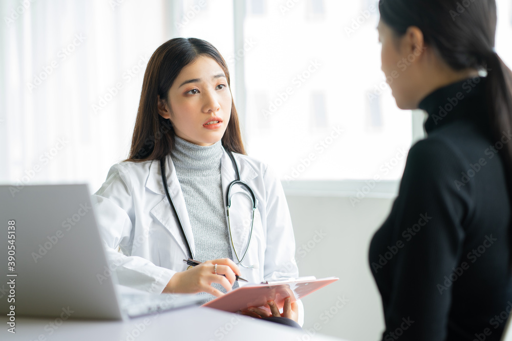 Asian female doctor is examining patients at clinic
Asian female doctor is examining patients at clinic