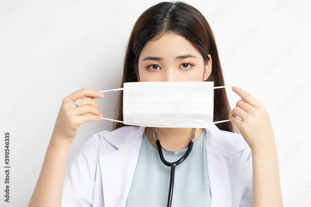 portrait of female doctor instructing to wear a mask properly portrait of female doctor instructing to wear a mask properly
