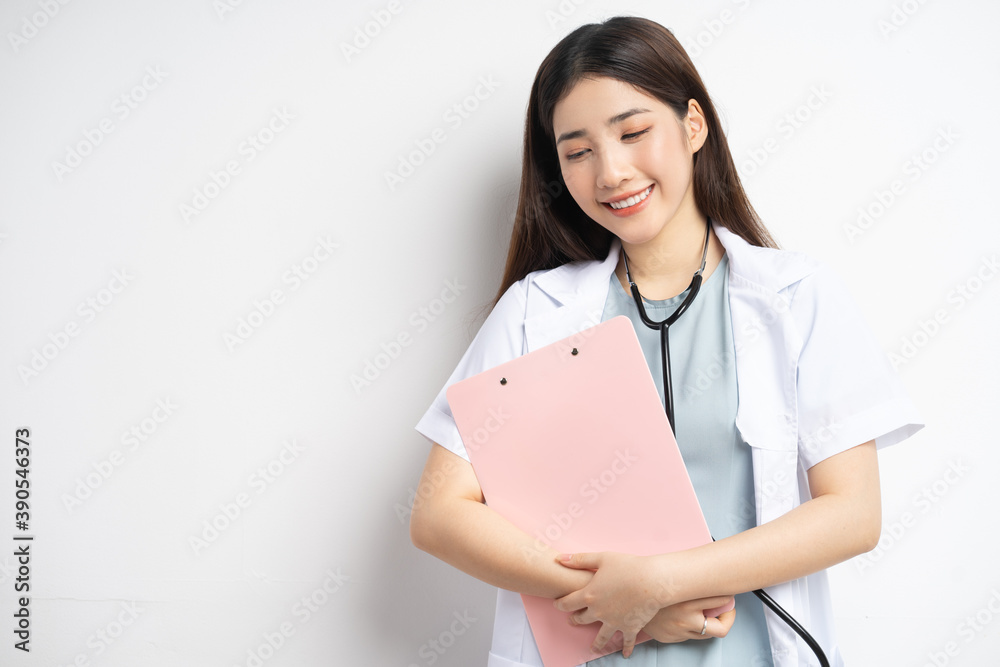 Portrait of female doctor holding document in hand
Portrait of female doctor holding document in hand