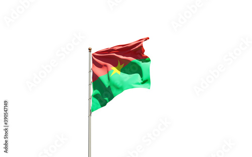 Beautiful national state flag of Burkina Faso on white background. Isolated close-up Burkina Faso flag 3D artwork.