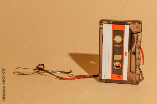 Old school cassette tape on a beige background photo