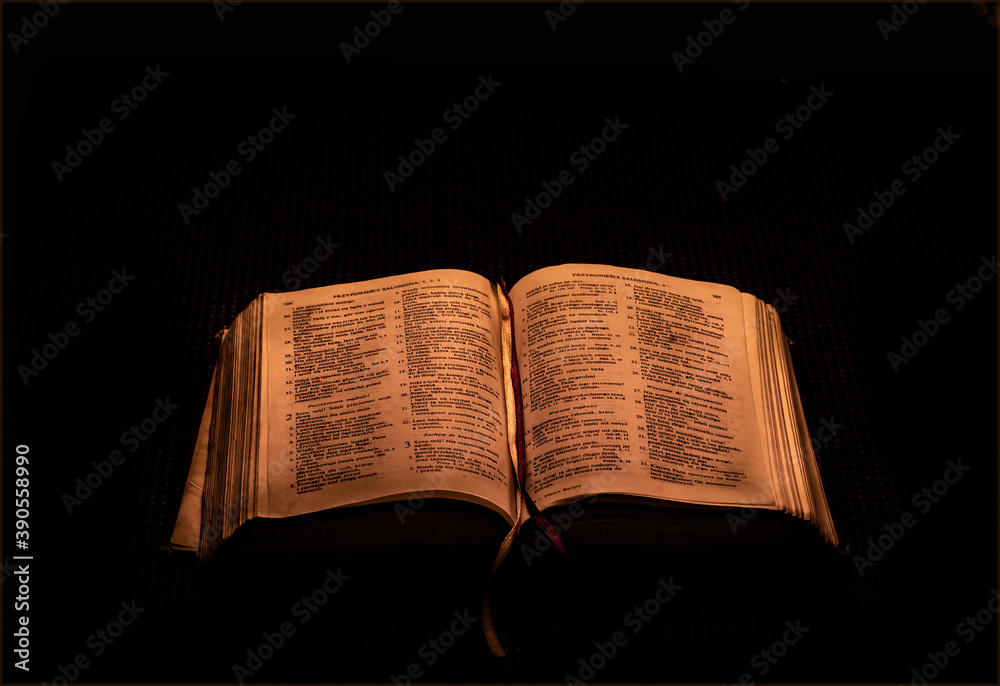 Fototapeta premium old book on black