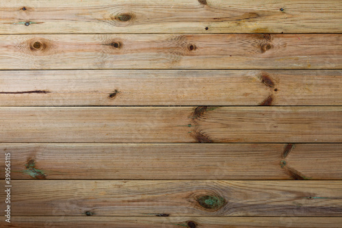 Closeup of natural background with pattern of wooden knotty planks ..
