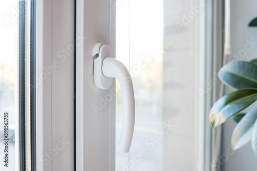 Broken plastic window handle. Crack in the structure