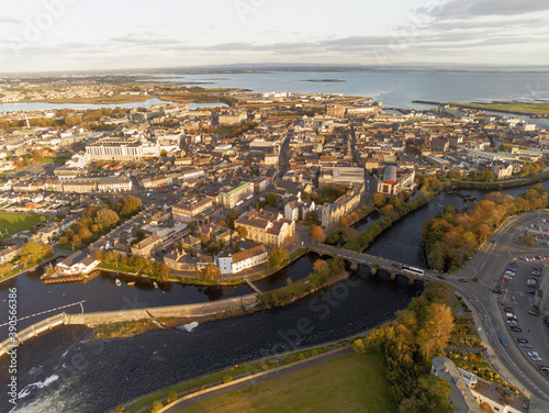 Aerial drone view on Galway city and river Corrib. Ireland, Cloudy sky.