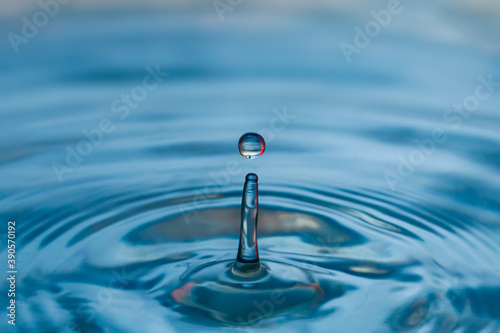 Blue Water drop splash with red tones