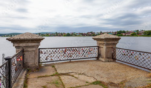 On the Stone bridge padlocks of those who marry, in the city of Sysert
