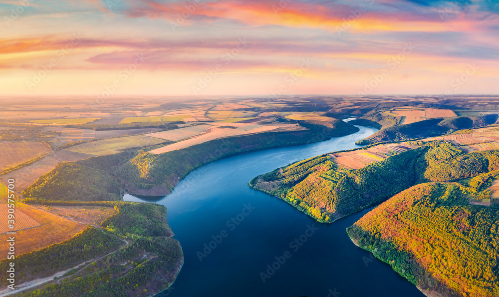 Unbelievable morning view from flying drone of Bakotska Bay. Picturesque summer sunrise on Dnister river, Ukraine, Europe. Beauty of nature concept background.