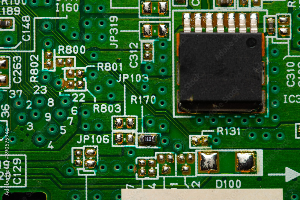 Electronic circuit close-up microchip on a green microcircuit with elements of transistors and strapping Electronic circuit close-up microchip on a green microcircuit with elements of transistors and strapping