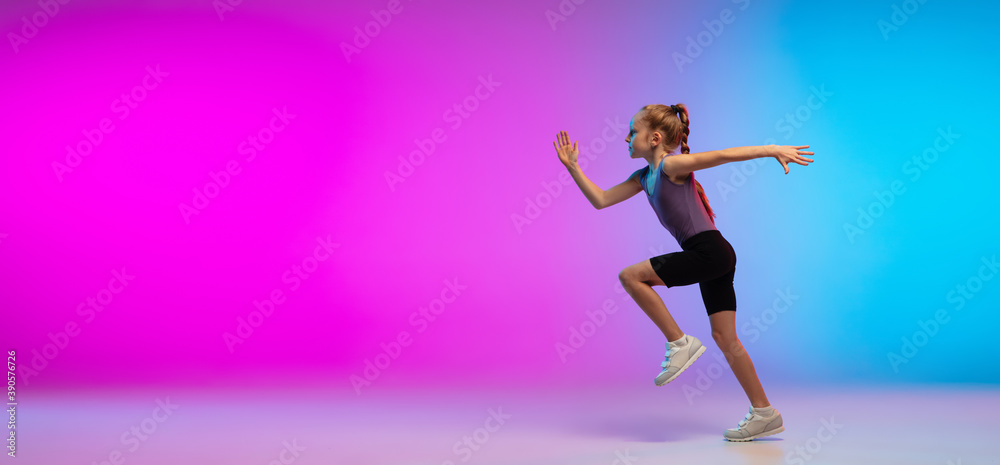 Flyer. Teenage girl, professional runner, jogger in action, motion isolated on gradient pink-blue background in neon light. Concept of sport, movement, energy and dynamic, healthy lifestyle.