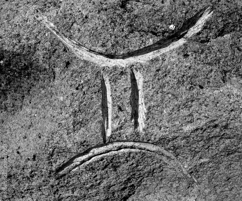 gemini zodiac sign curved in stone. Black and white