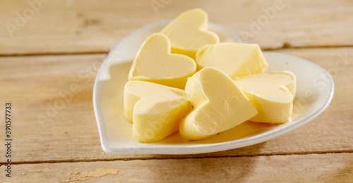 Romantic heart shaped butter pats on a plate