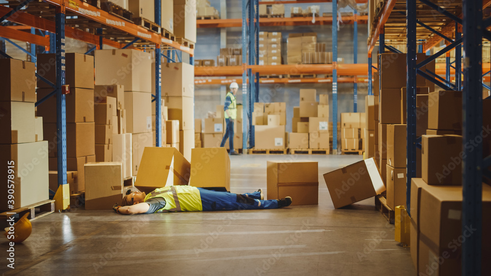 Shot of a Warehouse Worker Has Work Related Accident. He is Falling Down  BeforeTrying to Pick Up Heavy Cardboard Box from the Shelf. Hard Injury at  Work. Stock Photo | Adobe Stock
