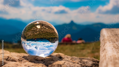 Crystal ball alpine landscape shot at the Wallberg near the famous Tegernsee, Bavaria, Germany © Martin Erdniss