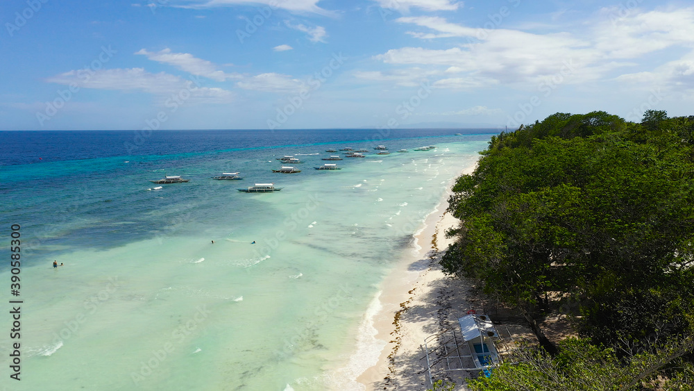 Aerial view of tropical beach on the island Panglao, Philippines. Seascape with beach.