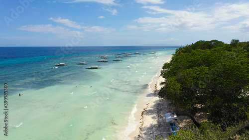 Aerial view of tropical beach on the island Panglao, Philippines. Seascape with beach.