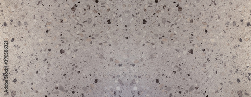 A pattern of concrete mixed with stone-chips