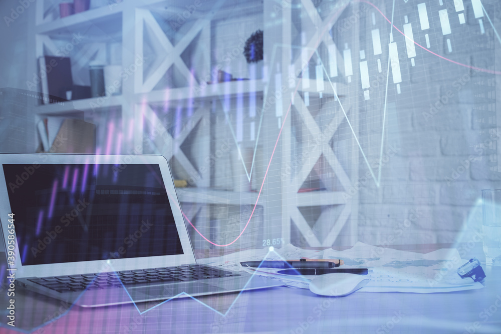 Obraz premium Forex Chart hologram on table with computer background. Double exposure. Concept of financial markets.