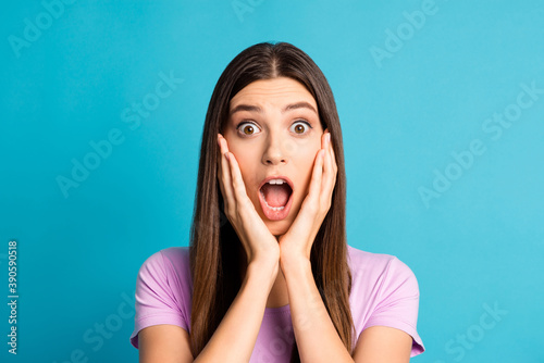 Photo of funny surprised woman girl wear casual violet outfit arms cheeks open mouth isolated blue color background
