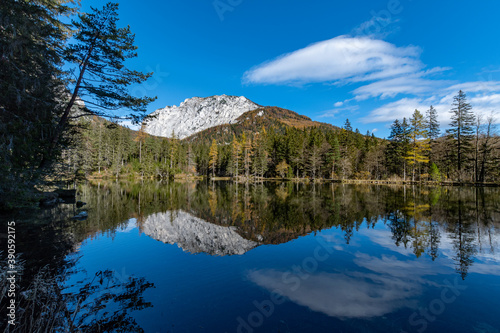 the "Kreuzteich" near the famous "Grüner See / Green lake" an the Pribitz mountain left and the Messnerin mountain right in the "Hochschwab" mountainrange, Styria, Austria on a clear autumn day