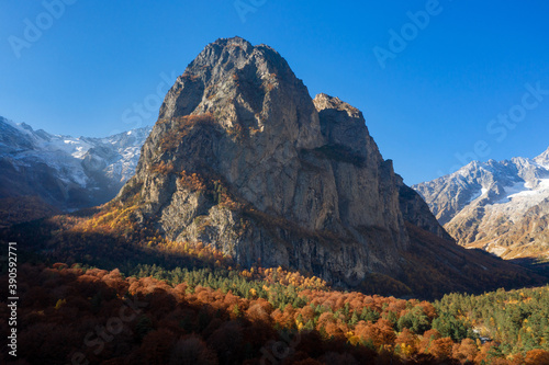 Caucasian mountain landscape. Tsey gorge. The mountain Monk (Monakh) and the river Tseydon. Republic of North Ossetia-Alania, Russia photo